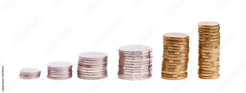 Australian coin stacks of silver and gold coins in growing columns like a bar chart Australian coin stacks of silver and gold coins in growing columns like a bar chart