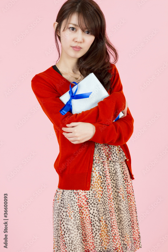 Beautiful young woman with gift Beautiful young woman with gift