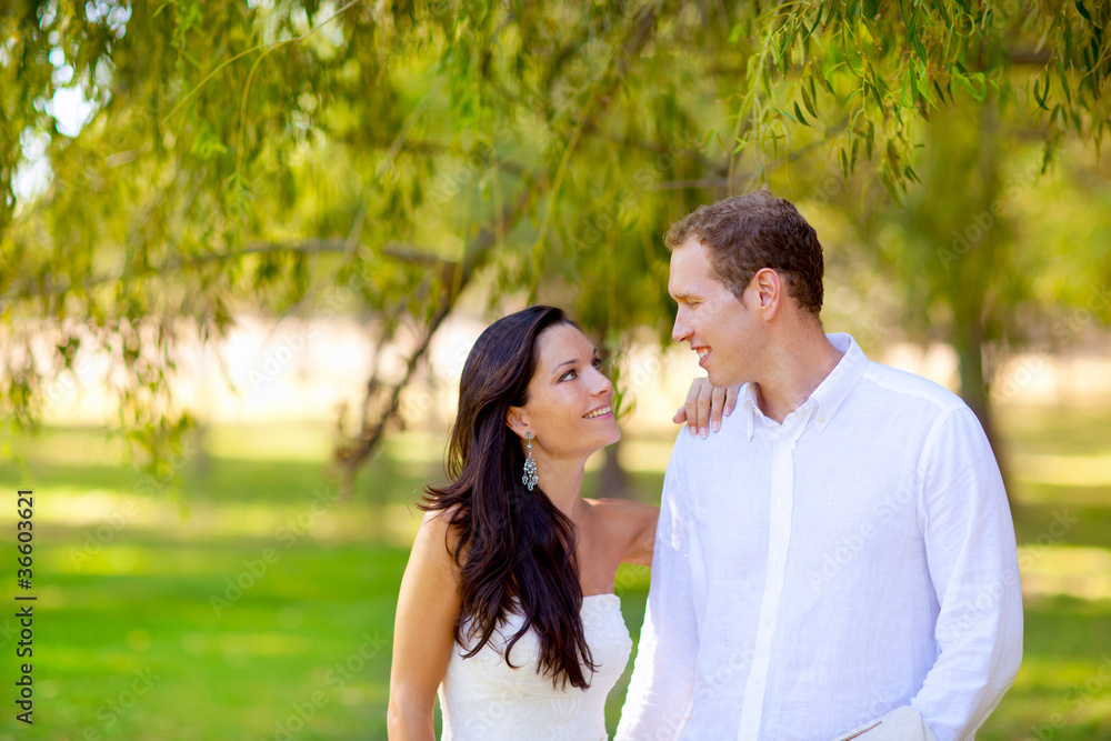 couple in love happy in green park outdoor