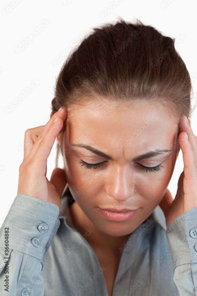 Close up of businesswoman having a headache Close up of businesswoman having a headache