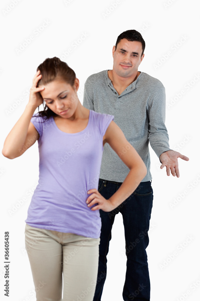 Young male has no clue how to calm his girlfriend Young male has no clue how to calm his girlfriend