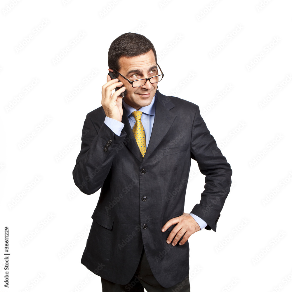 Portrait of confident businessman talking at the phone Portrait of confident businessman talking at the phone