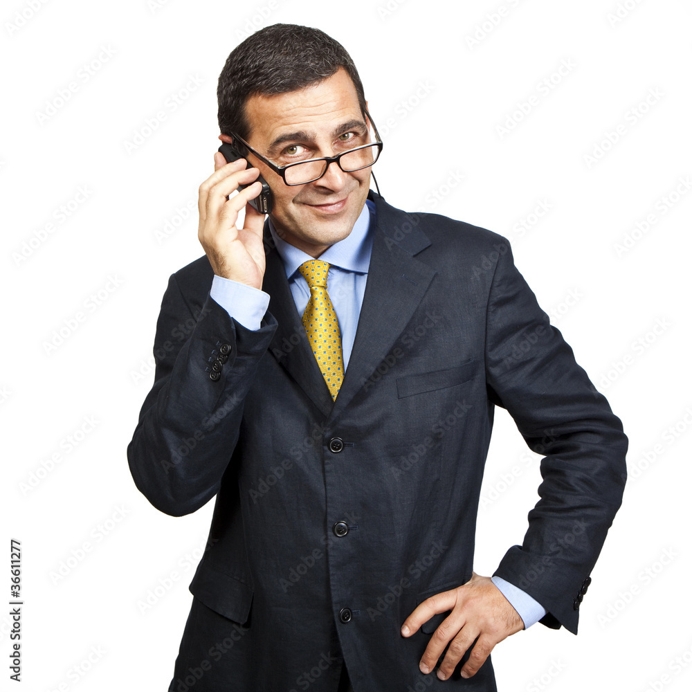 Portrait of confident businessman talking at the phone Portrait of confident businessman talking at the phone