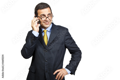 Portrait of confident businessman talking at the phone