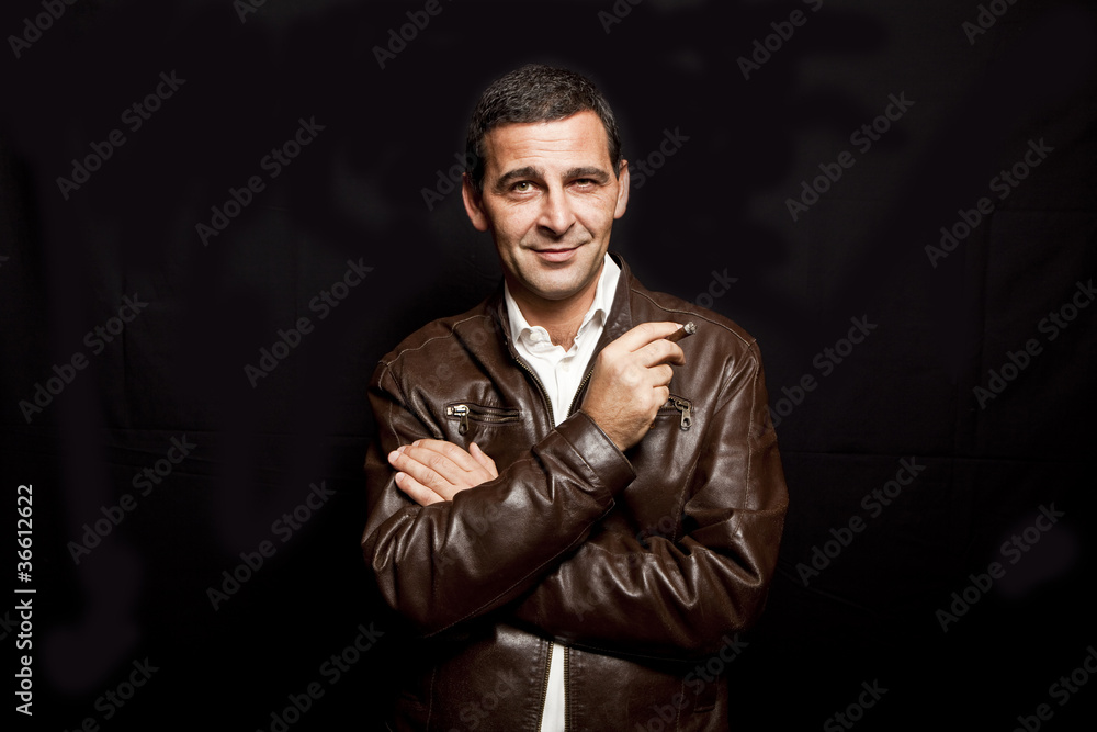portrait of a cool mature man with leather jacket over black bac portrait of a cool mature man with leather jacket over black bac