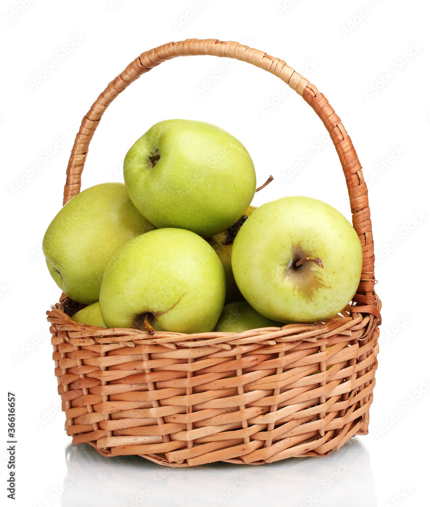 juicy green apples in the basket isolated on white juicy green apples in the basket isolated on white