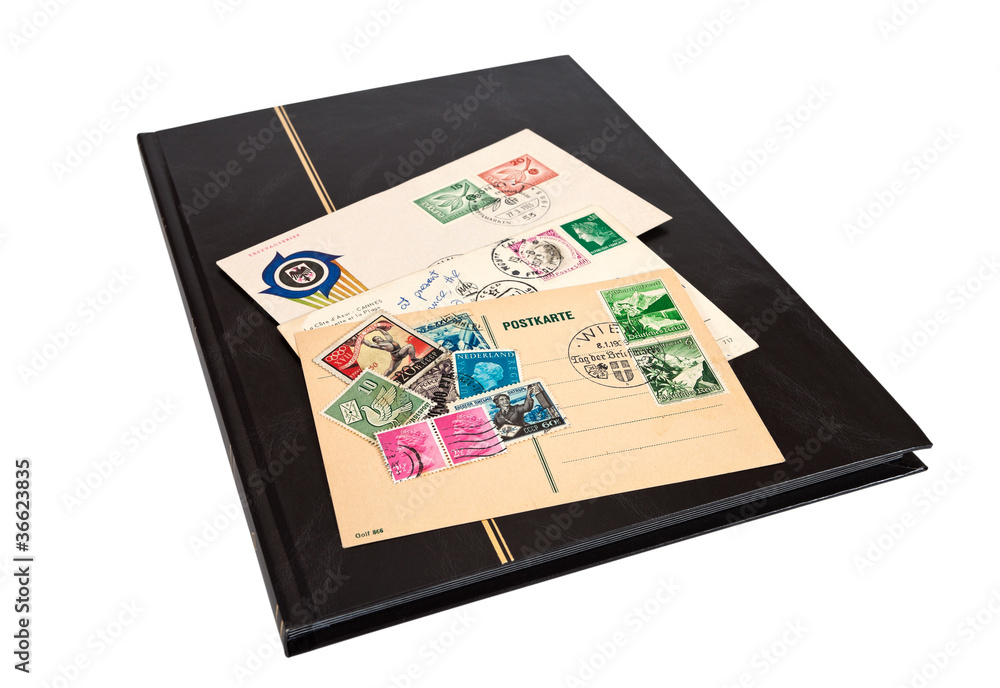 Fototapeta premium .Album of postage stamps isolated on white background