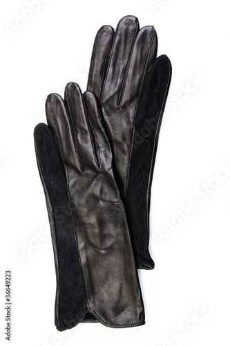 Beautiful black leather women's gloves isolated on white