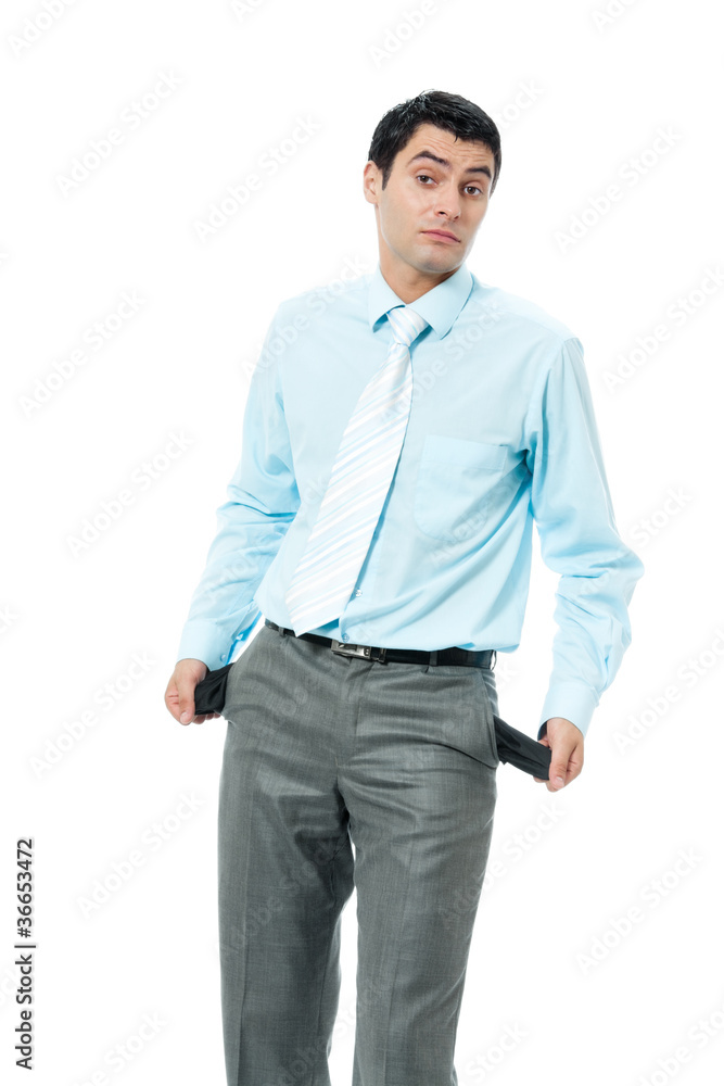 Unhappy businessman showing empty pockets Unhappy businessman showing empty pockets