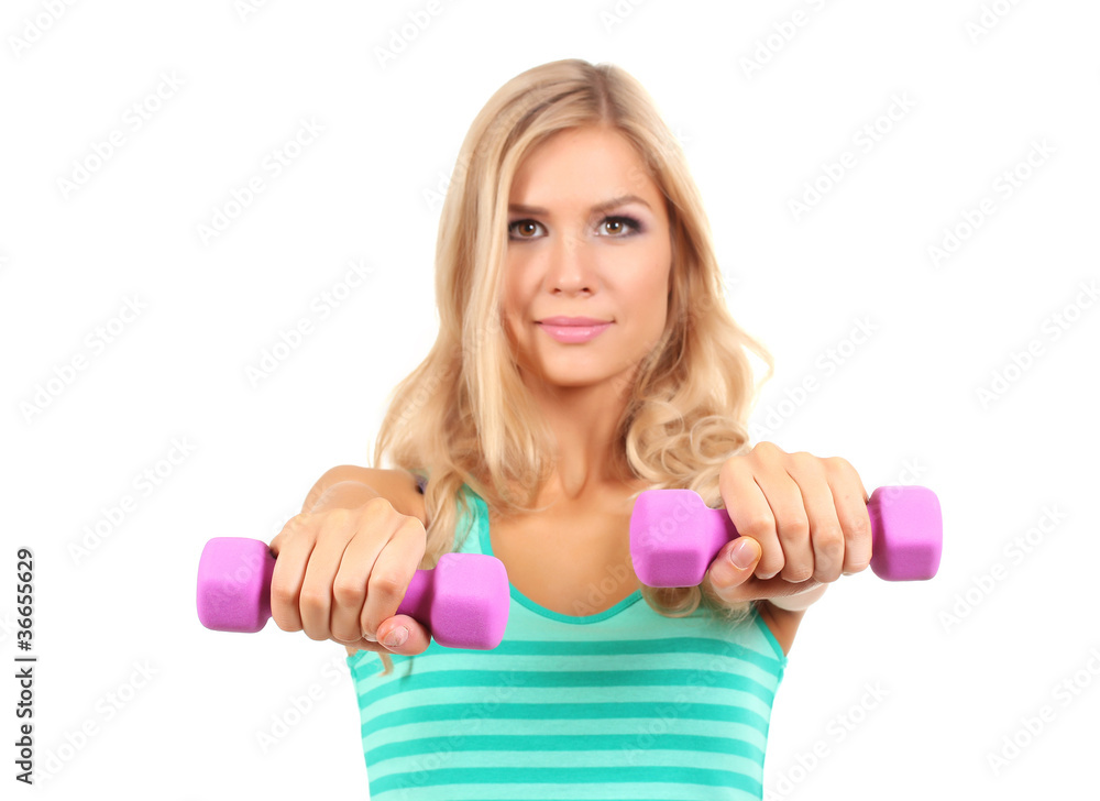 Beautiful girl with dumbbells isolated on white Beautiful girl with dumbbells isolated on white