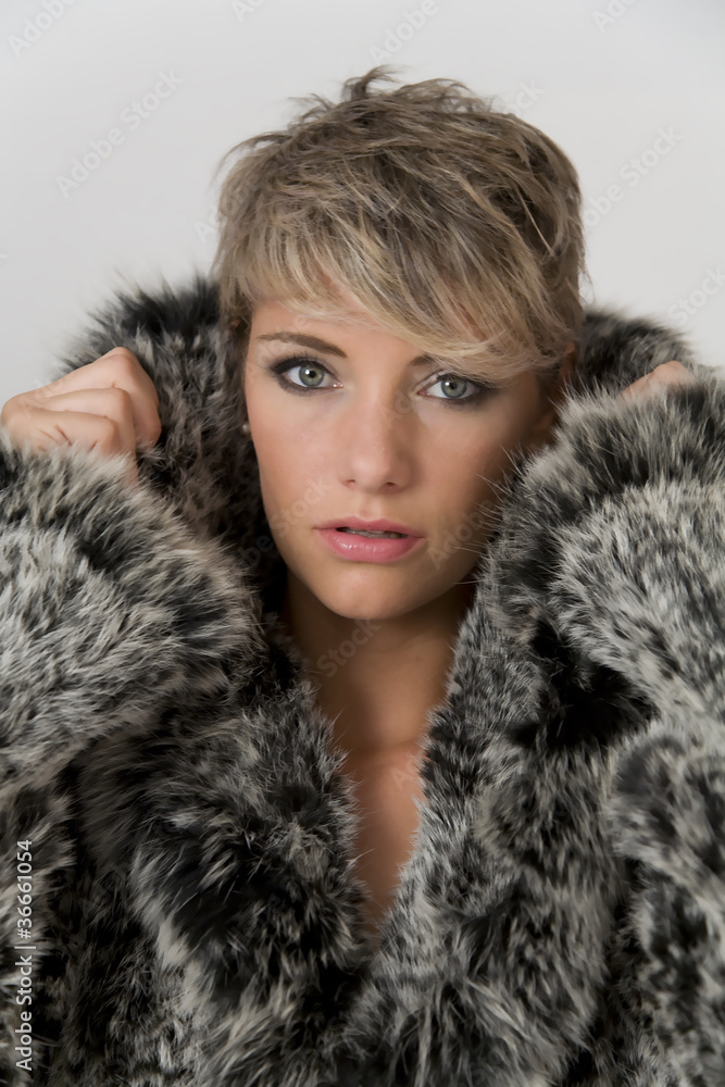 Portrait of pretty woman with real fur jacket Portrait of pretty woman with real fur jacket