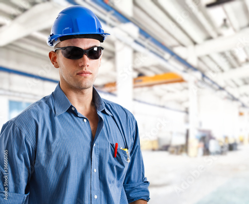Slika na platnu Handsome engineer in a factory