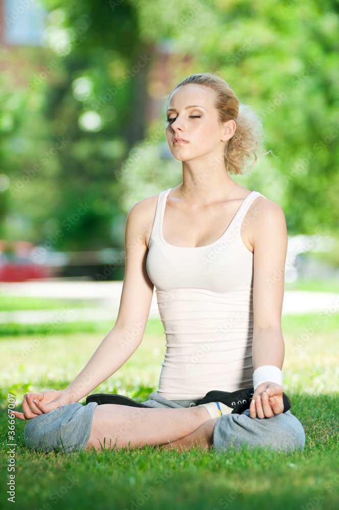 Young woman doing yoga exercise Young woman doing yoga exercise
