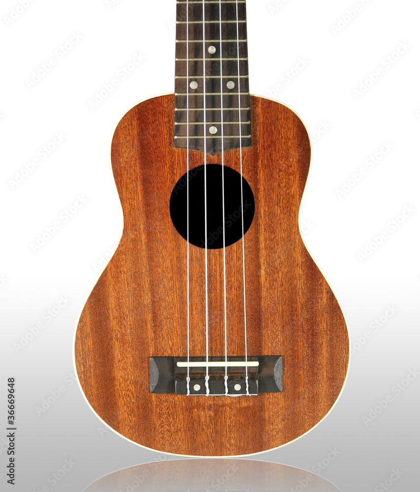 Obraz premium Close-up ukulele isolated over white background.
