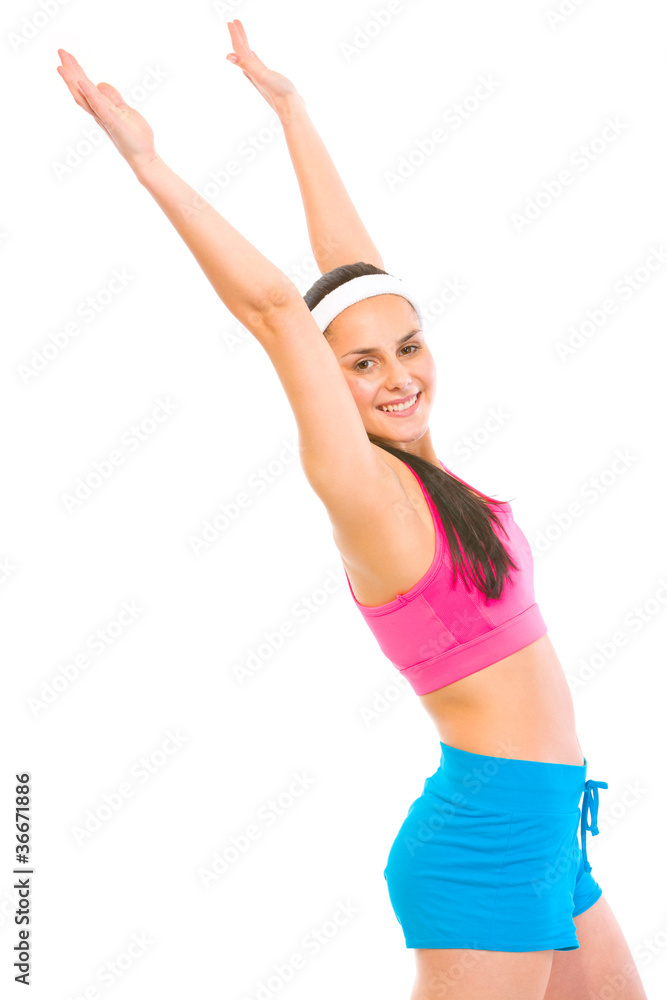 Smiling fit female in sportswear making exercise Smiling fit female in sportswear making exercise