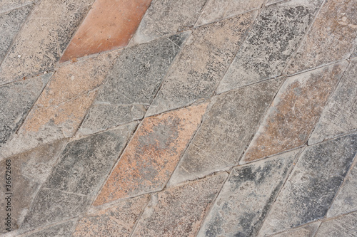 Very old paved church floor background