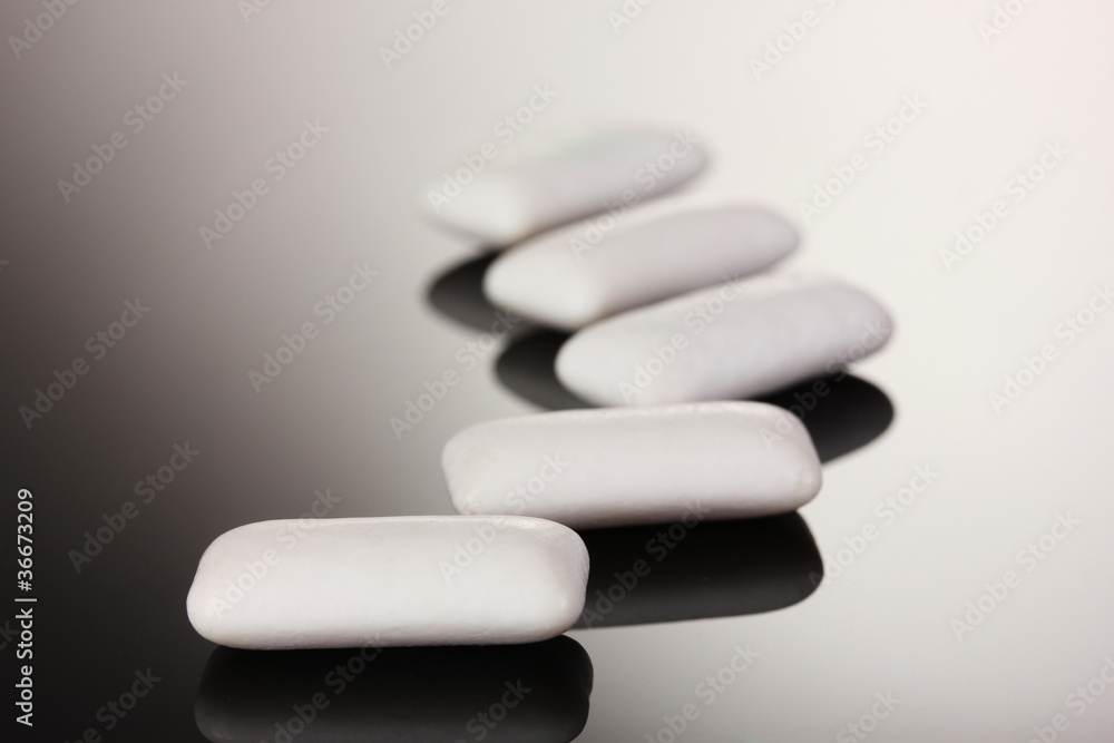 Chewing gums on gray background Chewing gums on gray background