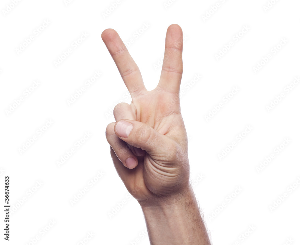 Hand showing the sign of victory and peace Hand showing the sign of victory and peace