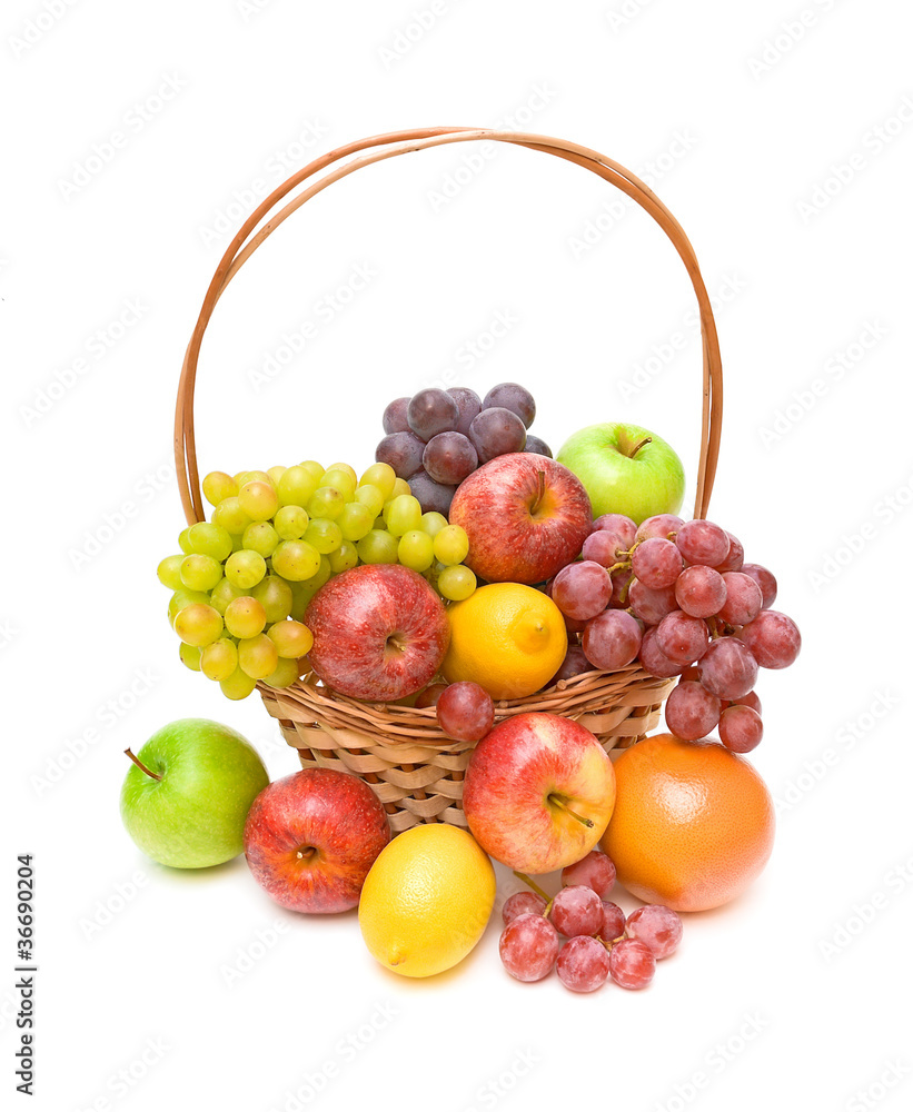 set fruit in a wicker basket on a white background
