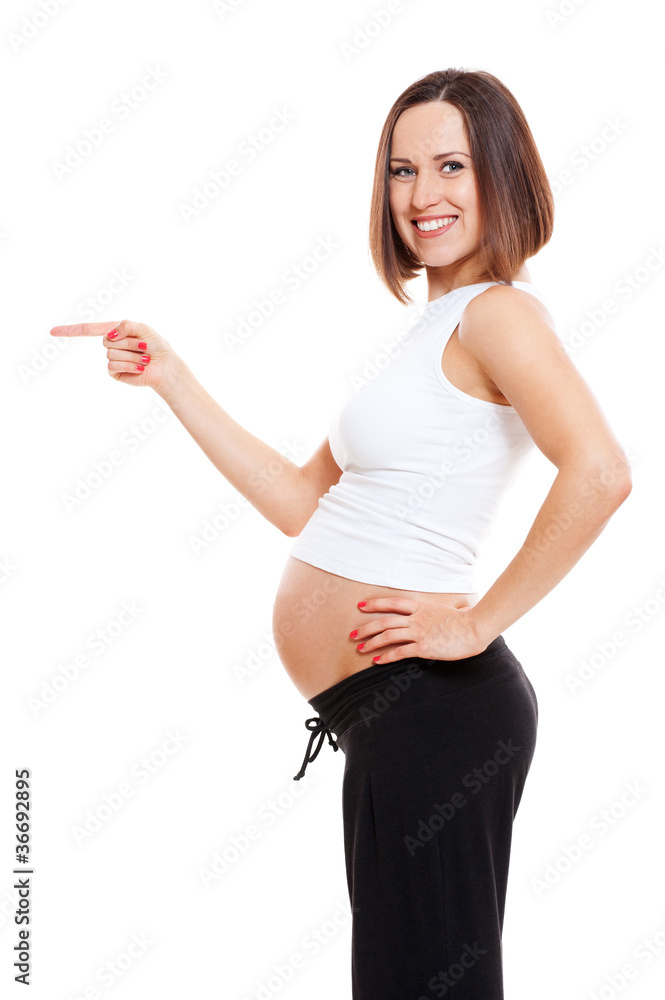pregnant woman pointing at something pregnant woman pointing at something