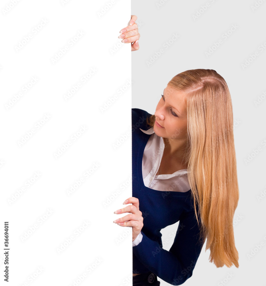 Happy young business woman showing blank signboard Happy young business woman showing blank signboard