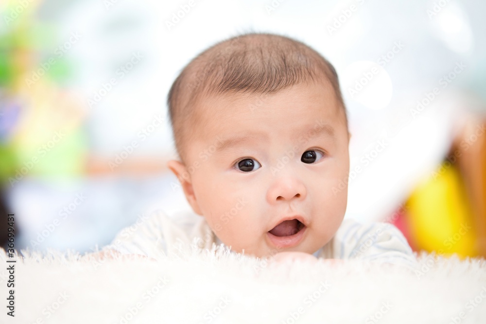 cute baby lie on bed