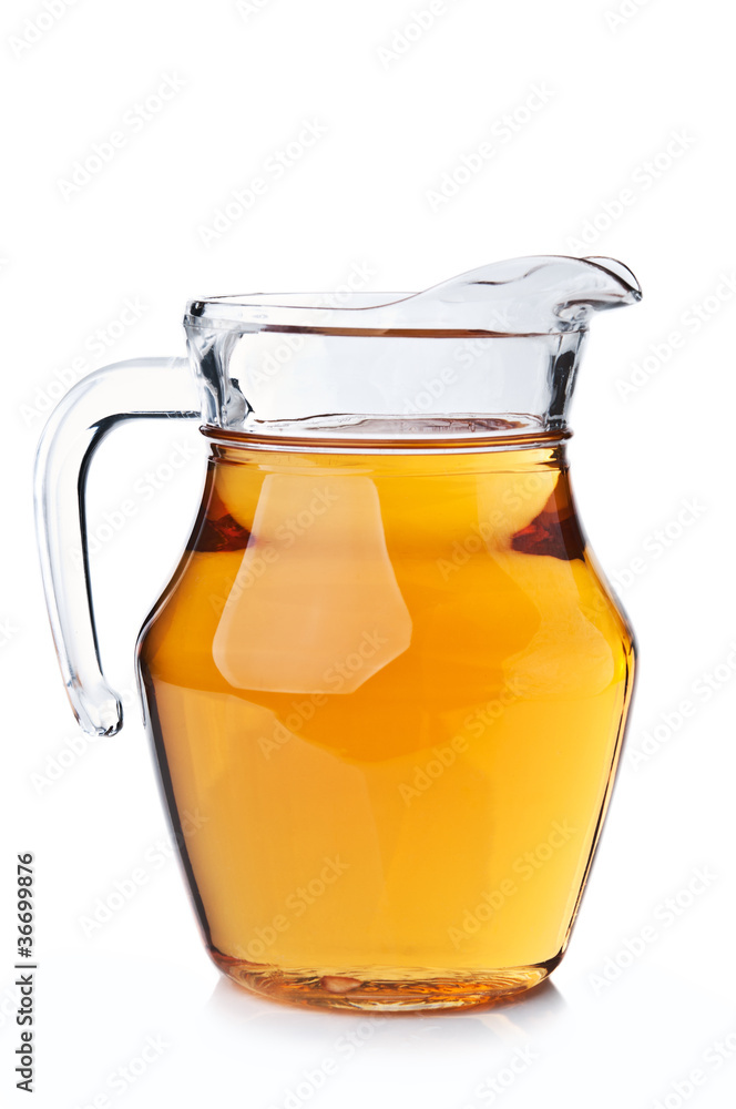 carafe full of apple juice carafe full of apple juice