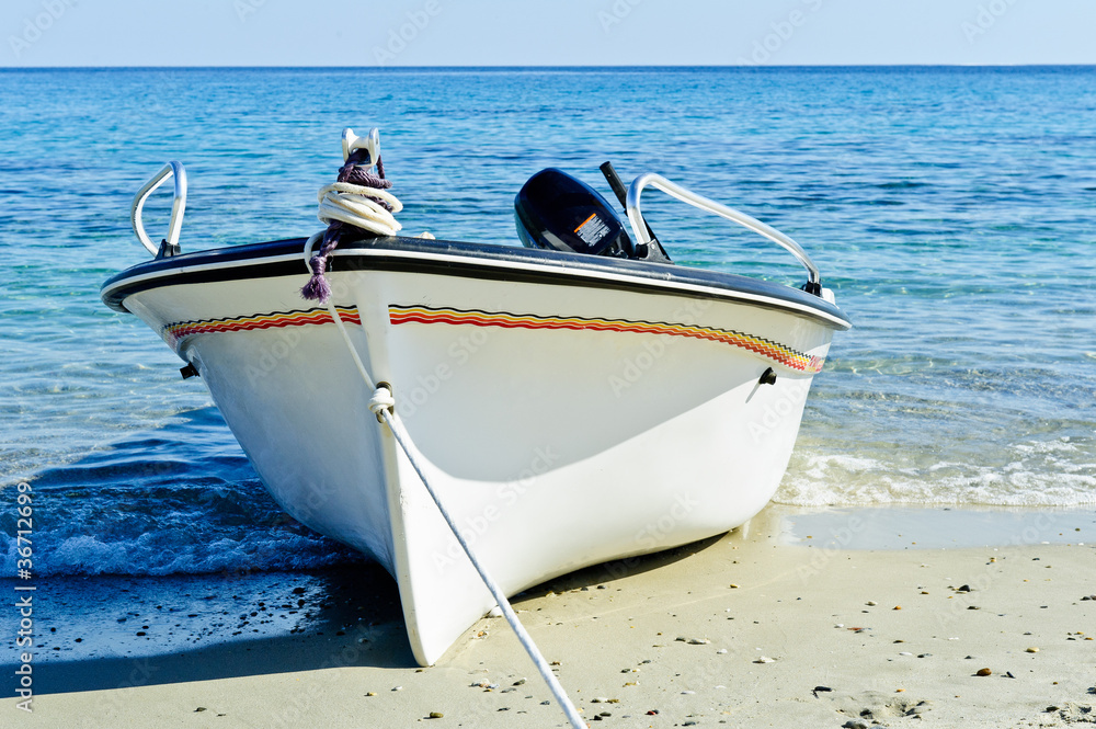 Naklejka premium Fishing boat on the beach