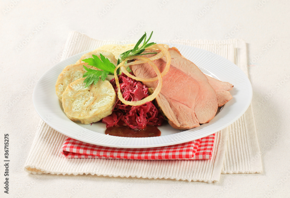 Roast pork, dumplings and red cabbage Roast pork, dumplings and red cabbage