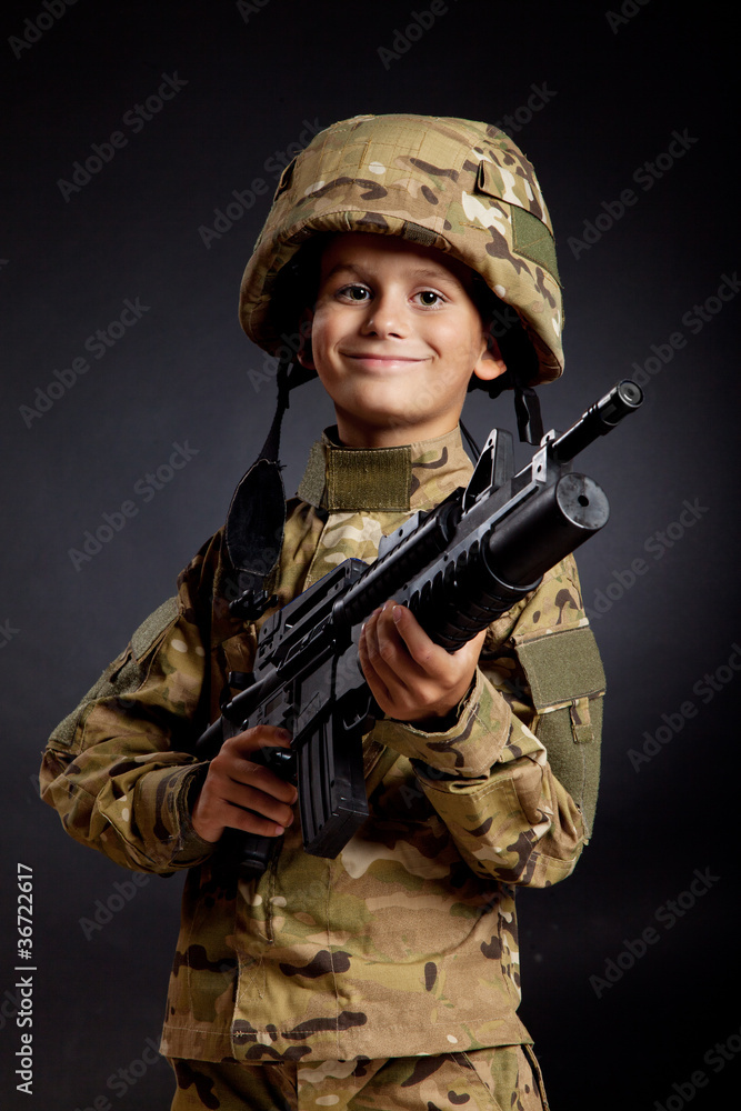 Young soldier with rifle Young soldier with rifle