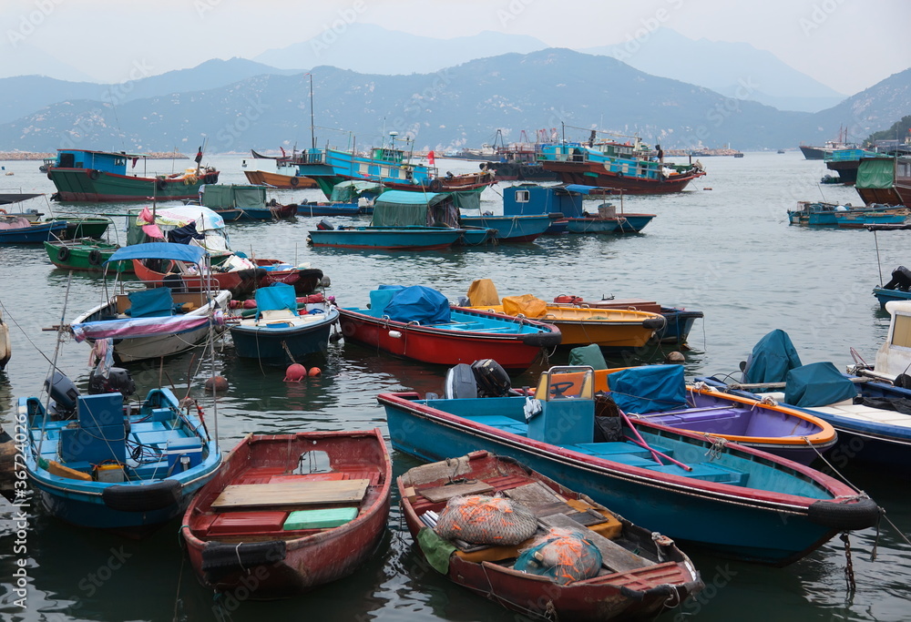 Fishing and house boats in Cheung Chau harbour. Hong Kong.