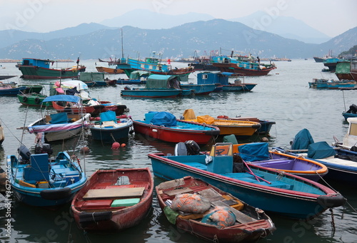 Photography Fishing and house boats in Cheung Chau harbour. Hong Kong.