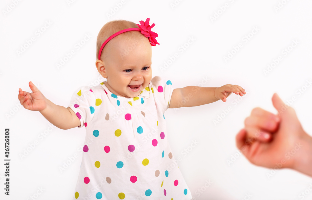 Little blond girl in studio