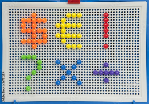 letter a dots pattern in bright colours.