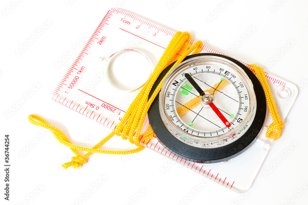 Compass with scales and rules isolated on white Compass with scales and rules isolated on white