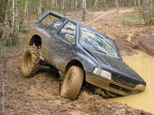 Big 4x4 off roader stuck in mud