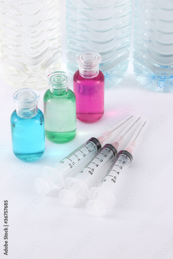 Medical preparation on clinic table with pure water. Medical preparation on clinic table with pure water.