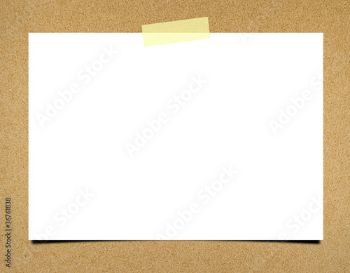 Blank note paper on board background