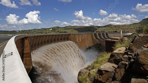 Time lapse of a big dam with strong flowing water photo