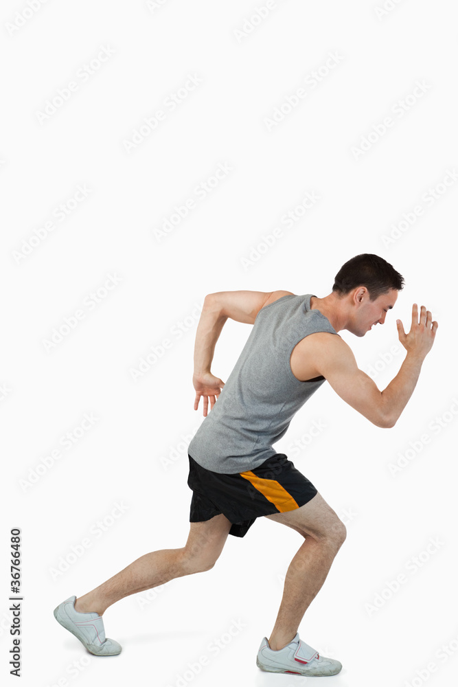 Young male warming up before training