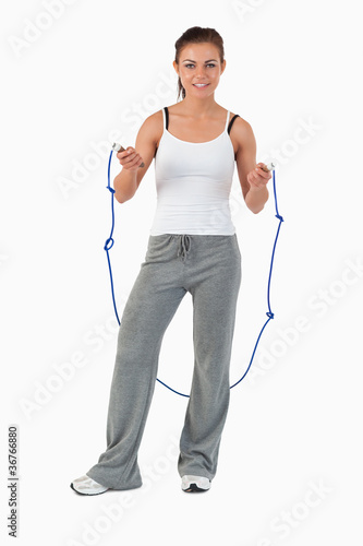 Young woman about to start jump roping
