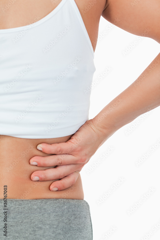 Close up of female with back pain Close up of female with back pain