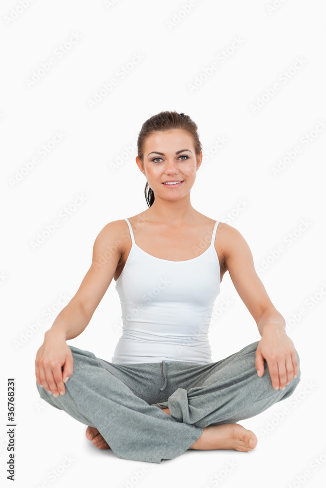 Portrait of a woman in the Sukhasana position Portrait of a woman in the Sukhasana position