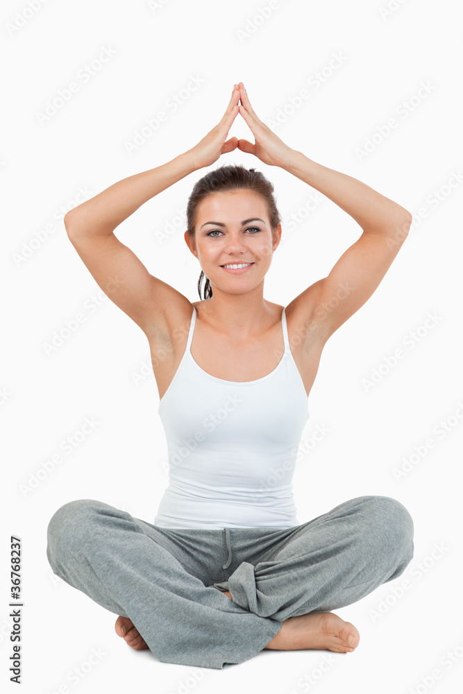 Portrait of a woman in a meditation position Portrait of a woman in a meditation position