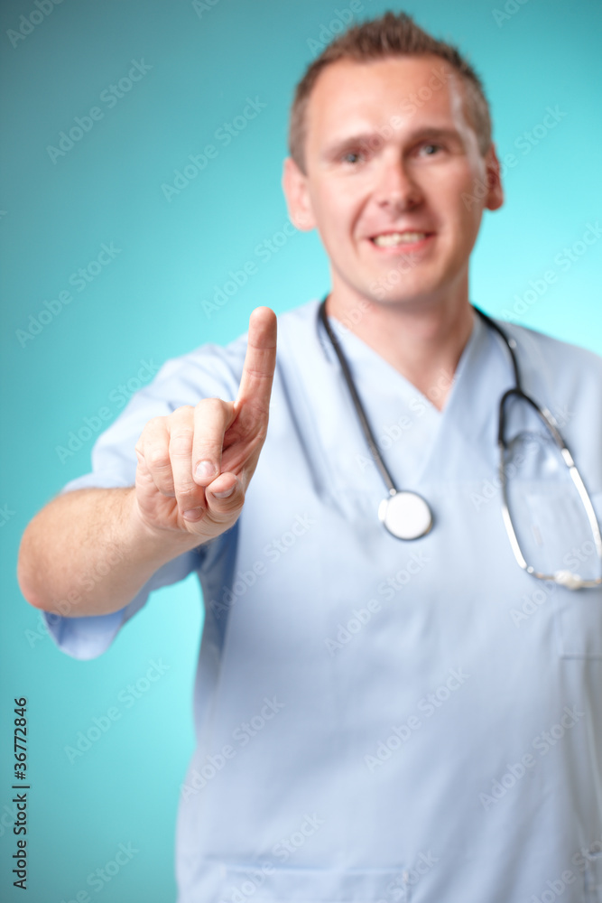 Medicine doctor pointing at something with his finger Medicine doctor pointing at something with his finger