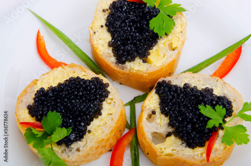 Black caviar in the plate