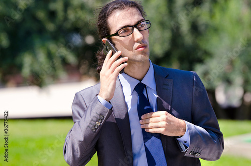 Young businessman at the street scene