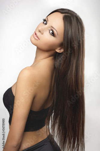 Portrait of young and healthy girl with long hair
