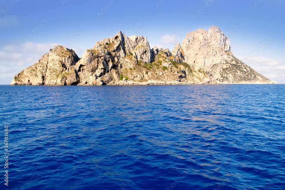 Es Vedra islet and Vedranell islands blue sea