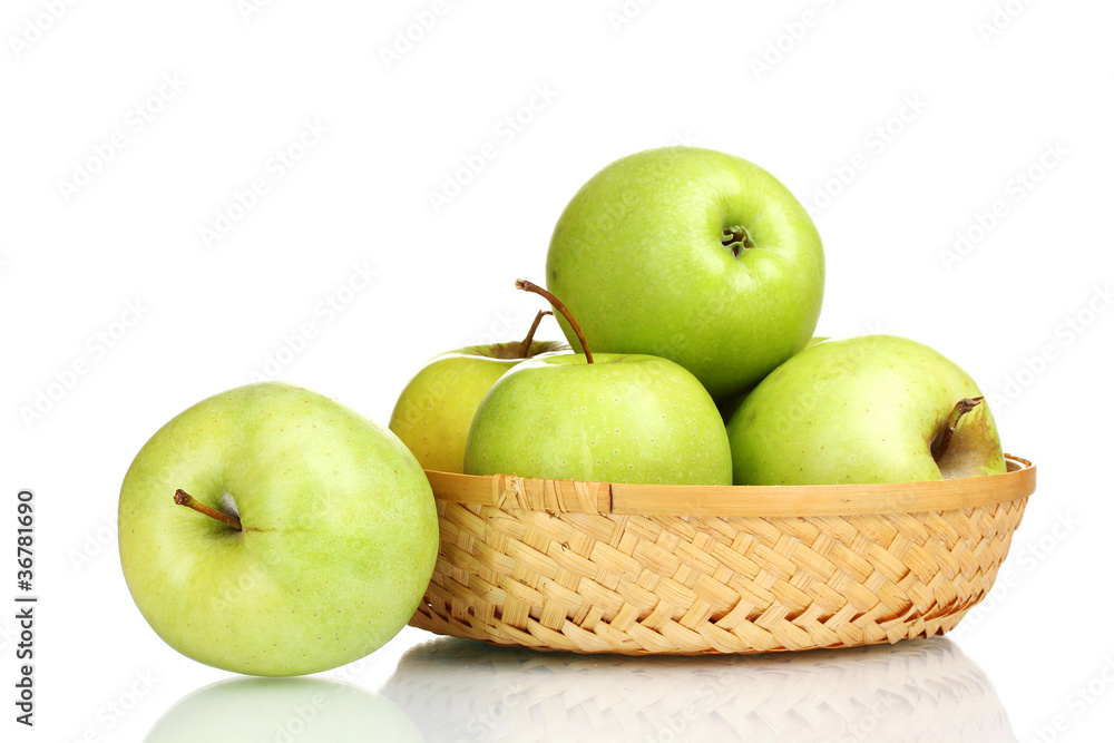 juicy green apples in the basket isolated on white juicy green apples in the basket isolated on white